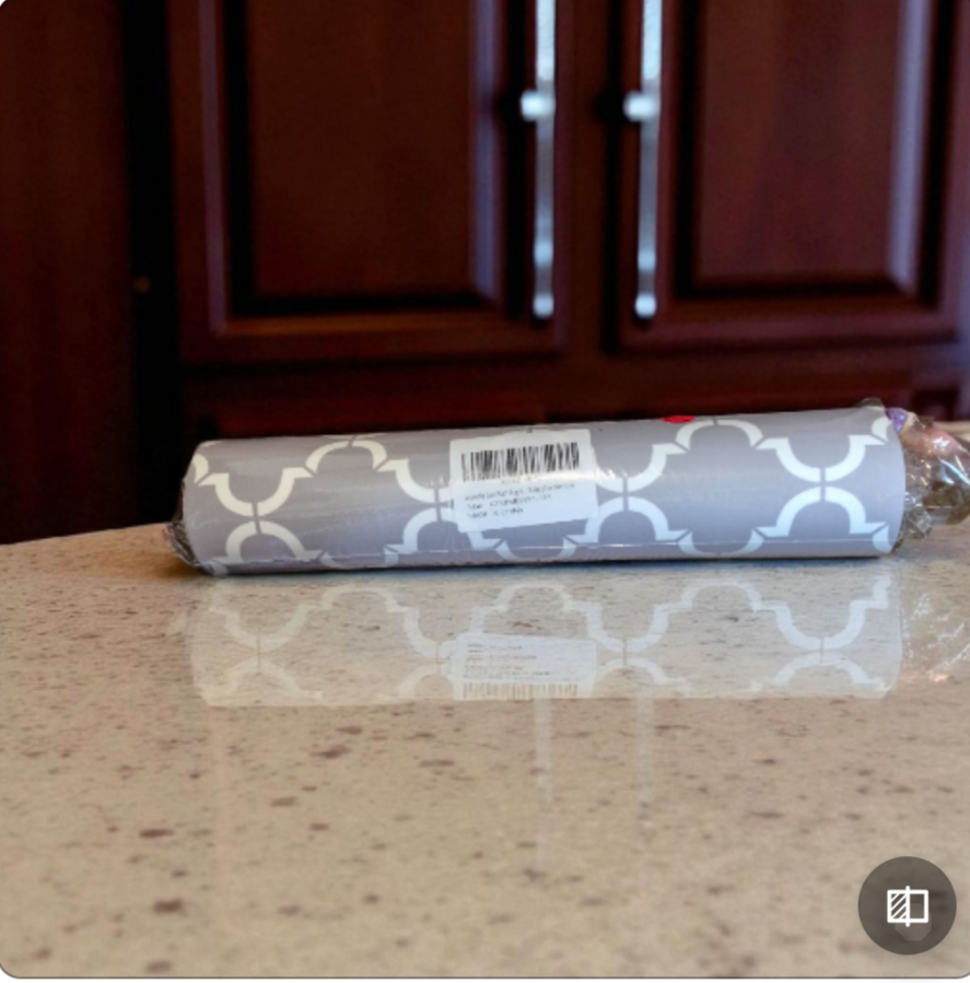 grey and white pattern bath mat