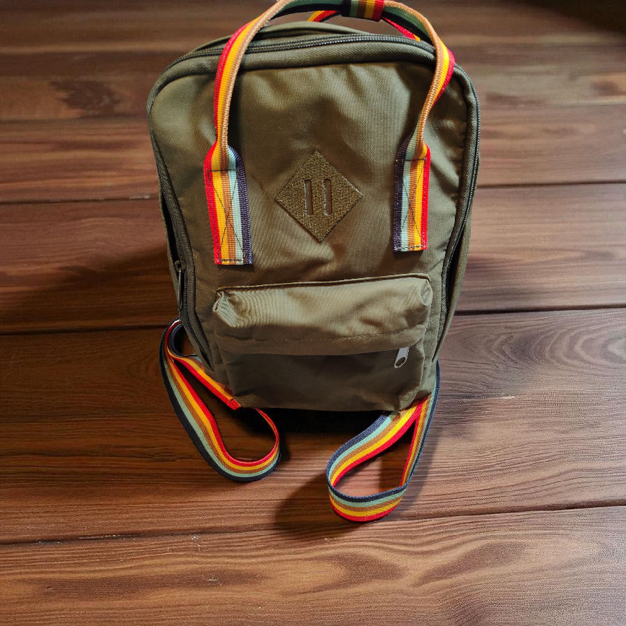 Rainbow strapped water resistant green back pack