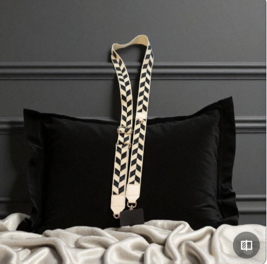 cream and black cell phone lanyard