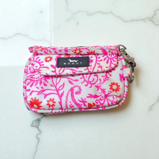 white wrist clutch with bright pink designs
