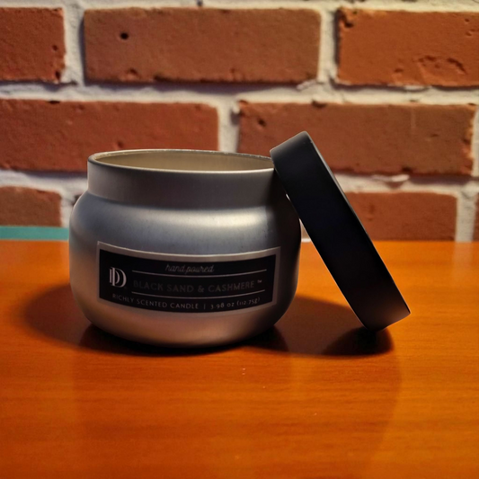 hand poured black sand and cashmere candle with lid
