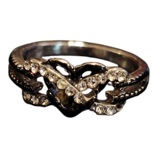 Silver Color Ring with White and Black Gems in an infinity heart pattern