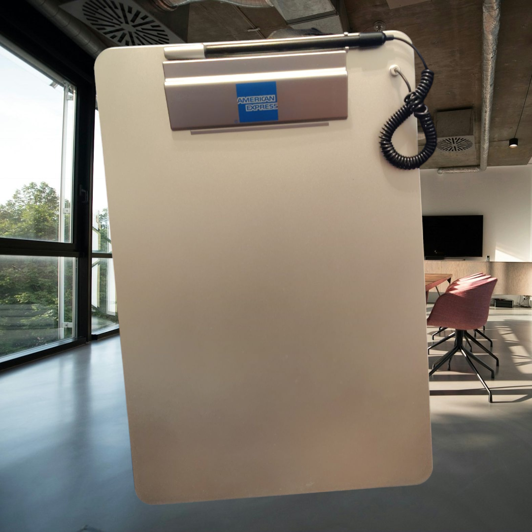 American Express clip board with attached pen  silver